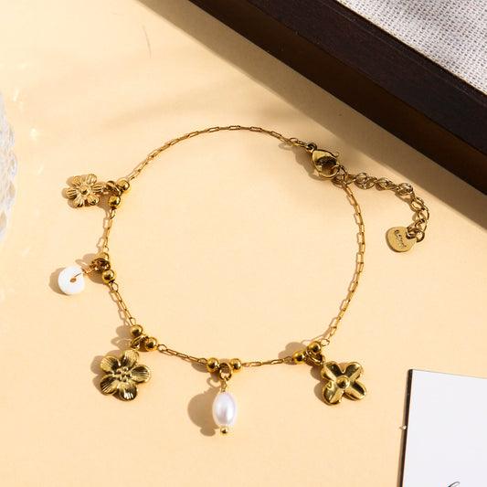 Bracelet fin charms fleurs délicates et perle