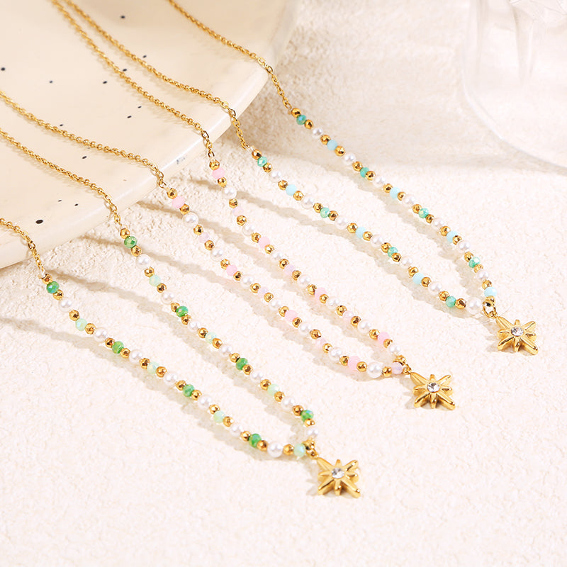 Collier doré cristaux pendentif étoile strass