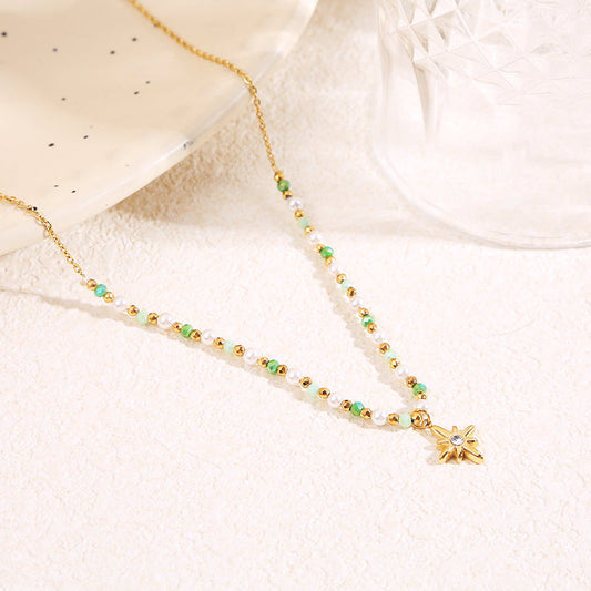 Collier doré cristaux pendentif étoile strass