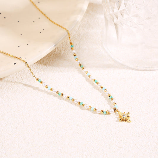 Collier doré cristaux pendentif étoile strass