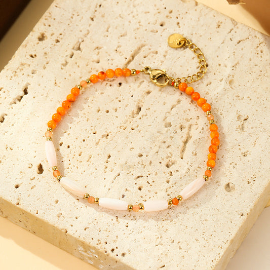 Bracelet Doré Perles et Éclats de Nacre Allongés