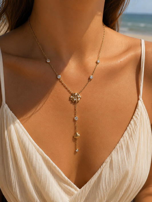 Collier doré en Y coquillage à pendentif strass