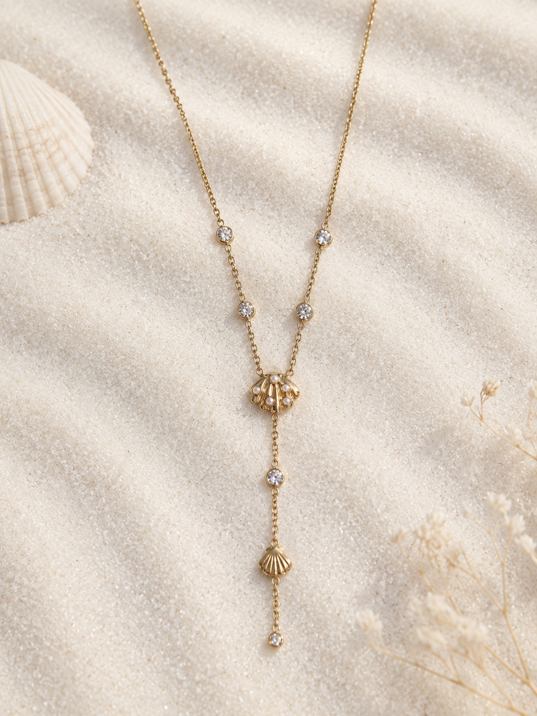 Collier doré en Y coquillage à pendentif strass